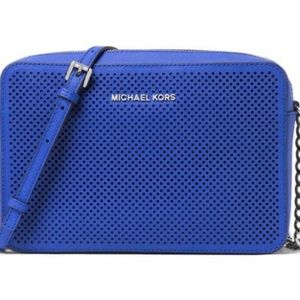 Michael Kors crossbody laser cut in electric blue.